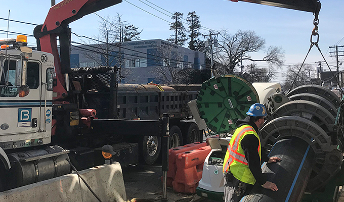 Fusing of end fittings onto installed pipe string after pulling into place Fusing of end fittings onto installed pipe string after pulling into place