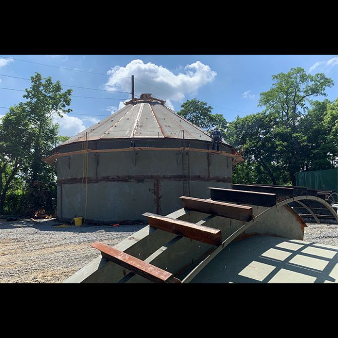 Sub assembly of top half of tank bowl, roof, and a portion of the balcony