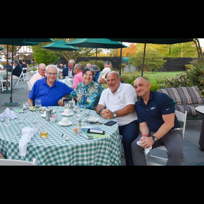 Steven A. Fangmann, Lucia Fangmann, Joseph Marturano and Lee Sackett of L’Abbate, Balkan, Colavita & Contini enjoy a beautiful evening after a day on the links.