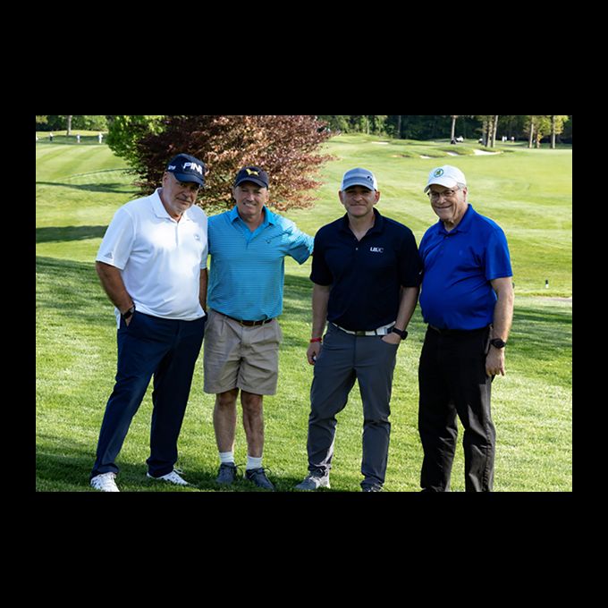 Joseph Marturano, Howard Tollin of Sterling Risk Insurance, Lee Sackett of L’Abbate, Balkan, Colavita & Contini, and Steven A. Fangmann on the course.