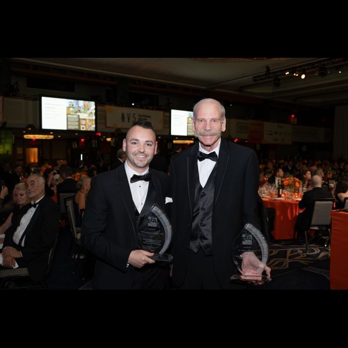 Thomas P. Schaefer, P.E., D&B Senior Associate and Robert L. Raab, P.E., BCEE, CCM, D&B Senior Vice President accept the 2025 ACEC New York Diamond Award for the “Ocean Beach Flood Mitigation and Resiliency Project."