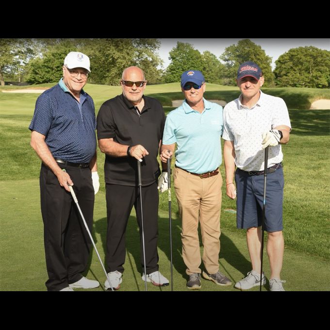 D&B President Steve Fangmann and D&B Senior Vice President Joe Marturano in a foursome with Howard Tollin of Sterling Risk and Lee Sacket of L’Abbate, Balkan, Colavita & Contini, LLP