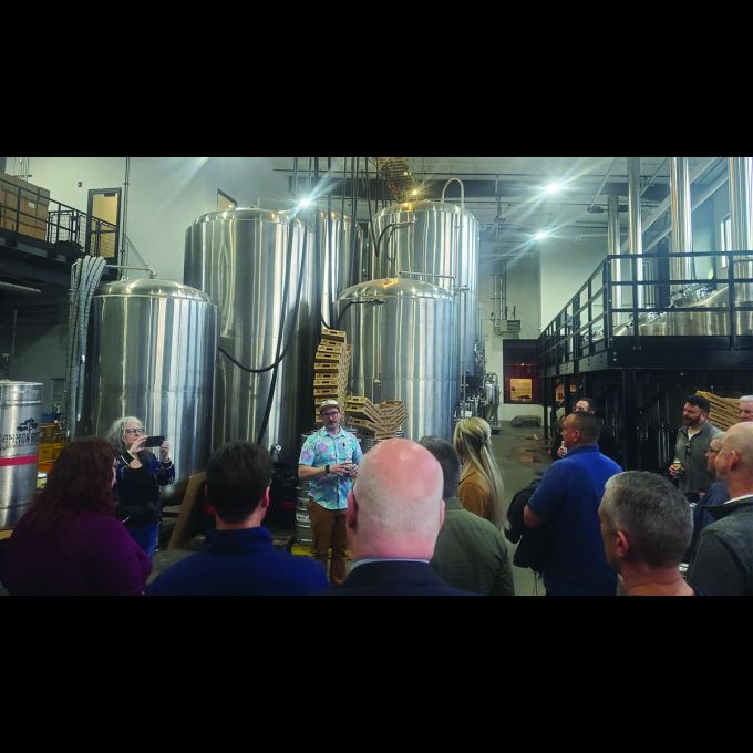 The D&B team joins a tour of the Common Roots Brewing Company during some free time.