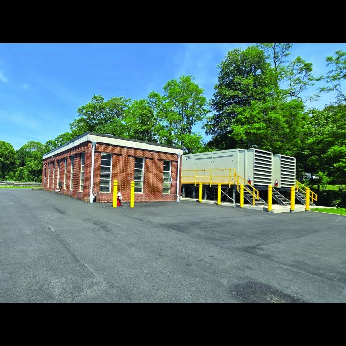 Infrastructure upgrades included replacement of two standby generators with dual 750-kilowatt diesel units operating in parallel for system resiliency.